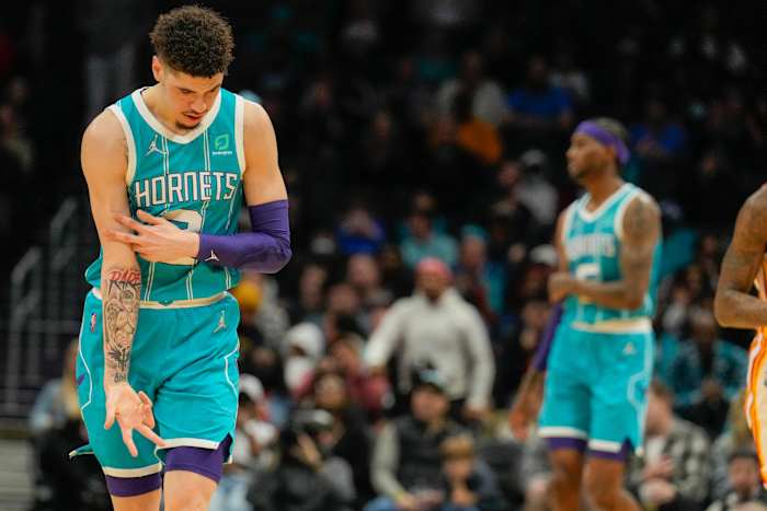 Mar 16, 2022; Charlotte, North Carolina, USA; Charlotte Hornets guard LaMelo Ball (2) reacts to his three point shot against the Atlanta Hawks during the second quarter at the Spectrum Center.